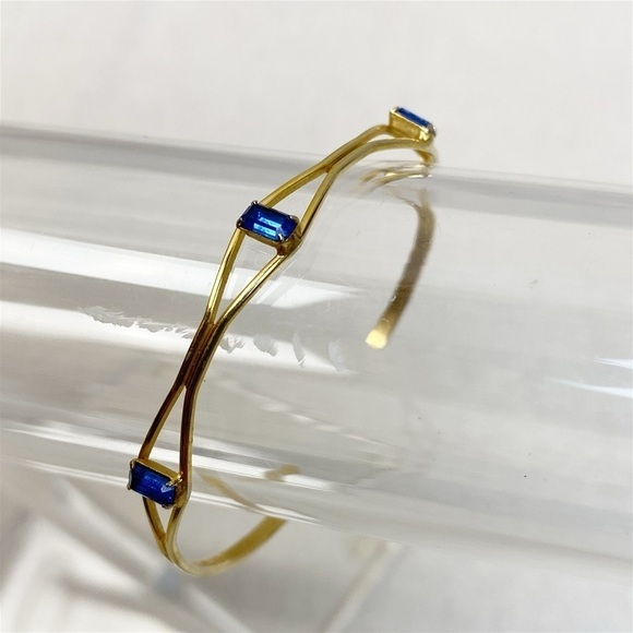 Gold tone delicate Blue emerald cut rhinestone cuff bracelet - Picture 1 of 3